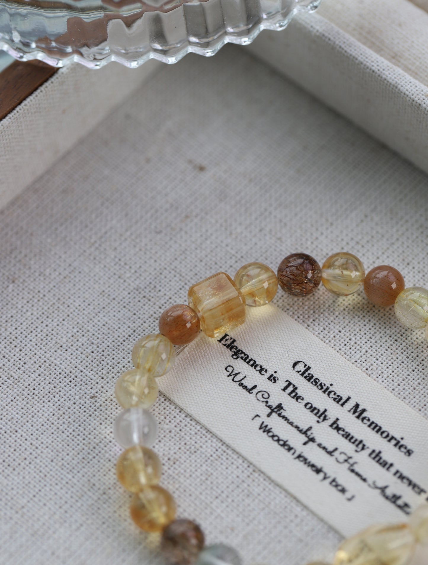 "Quiet Luxury" Crystal Bracelet - Yellow & Black Gold, Titanium, and Copper